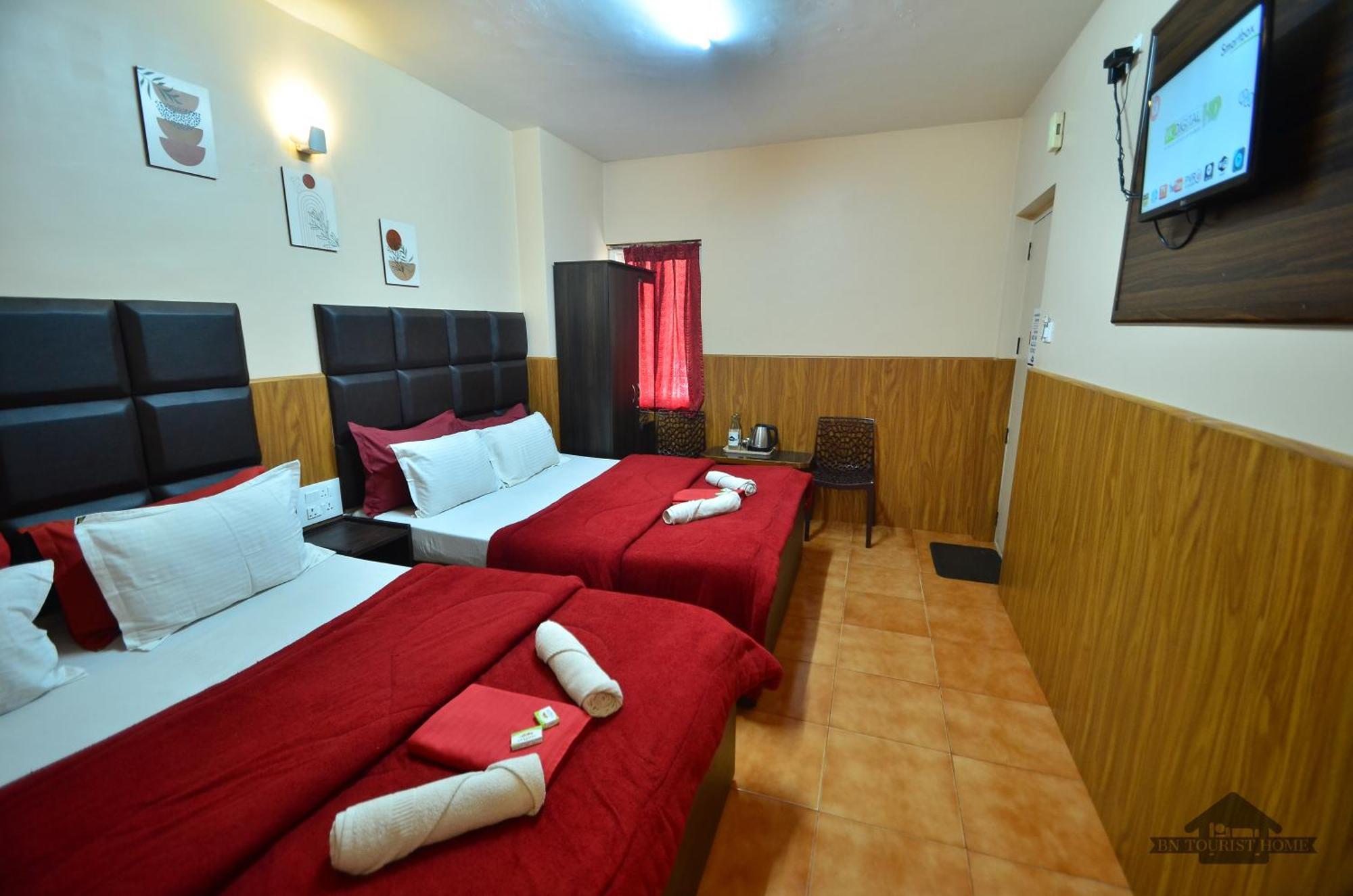 Bn Tourist Home Ooty Rum bild